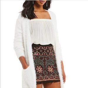 Chelsea and Violet long eyelash cardigan